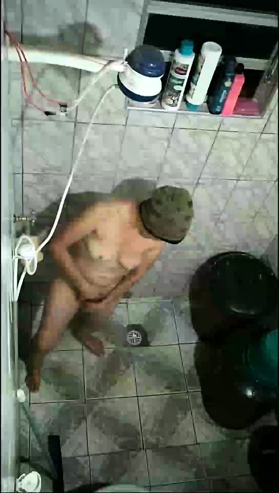 my mother-in-law washing her pussy! short video!