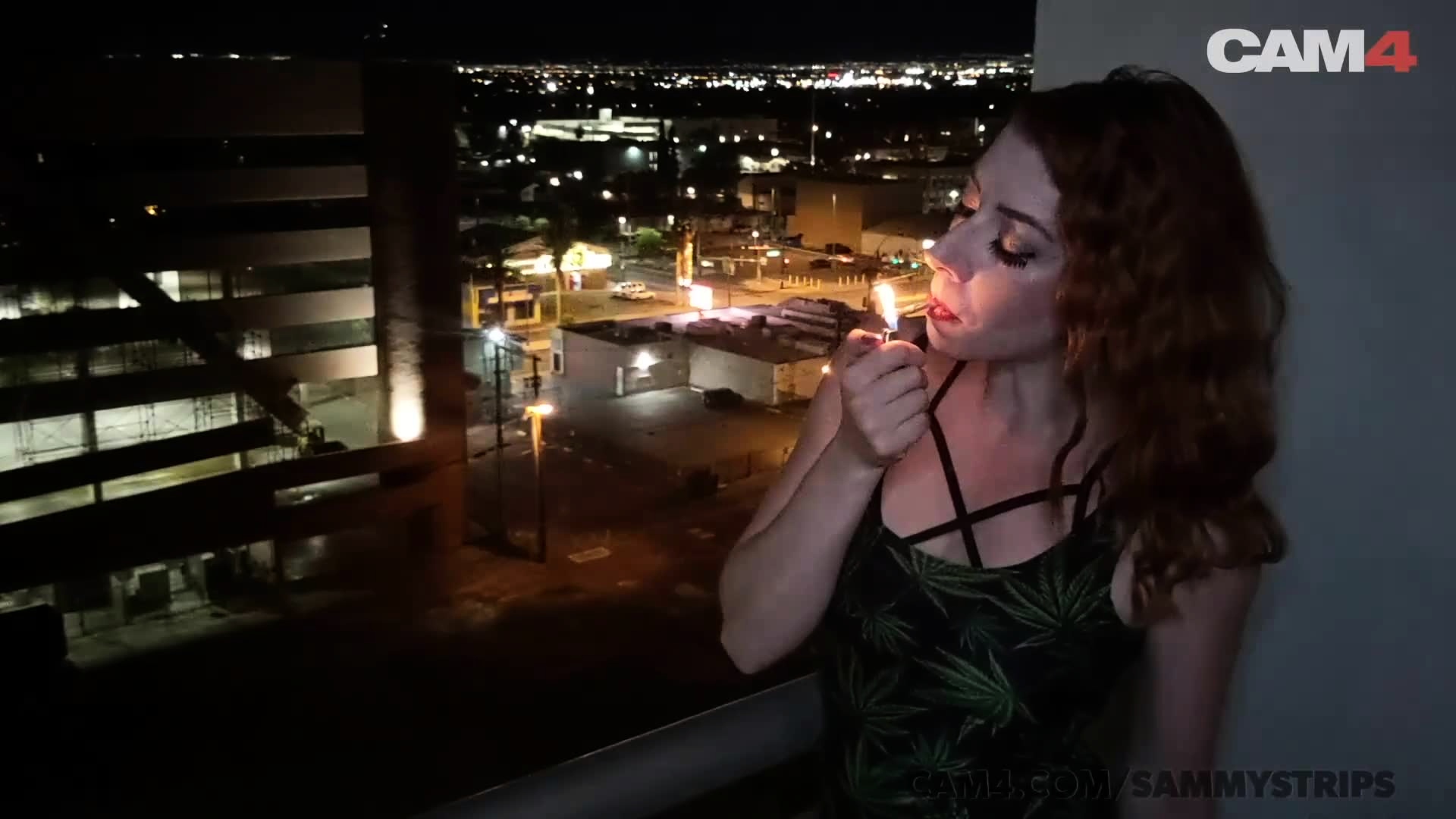 Petite redhead smoking and stripping