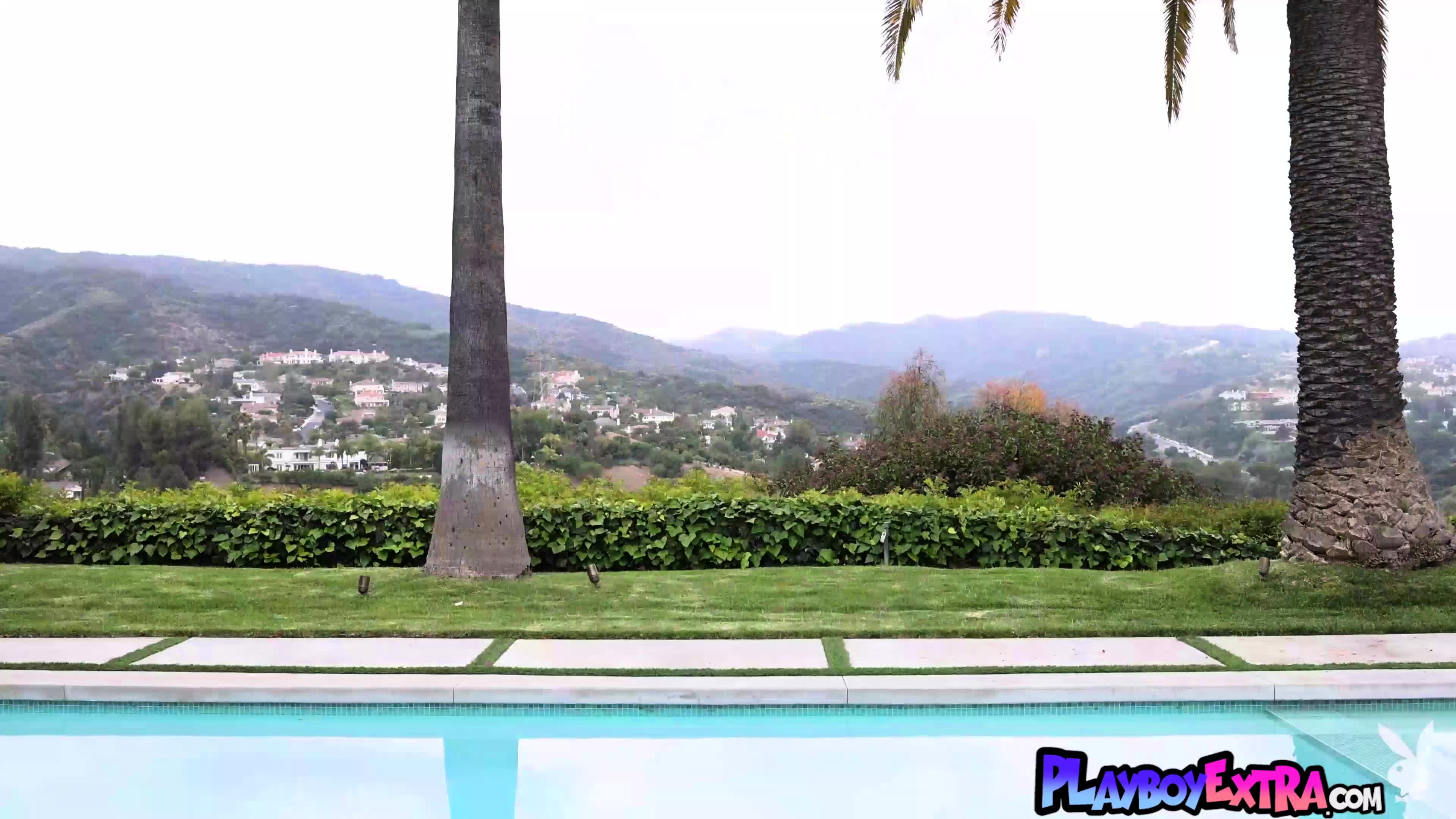 Petite blondie posing nude in the garden