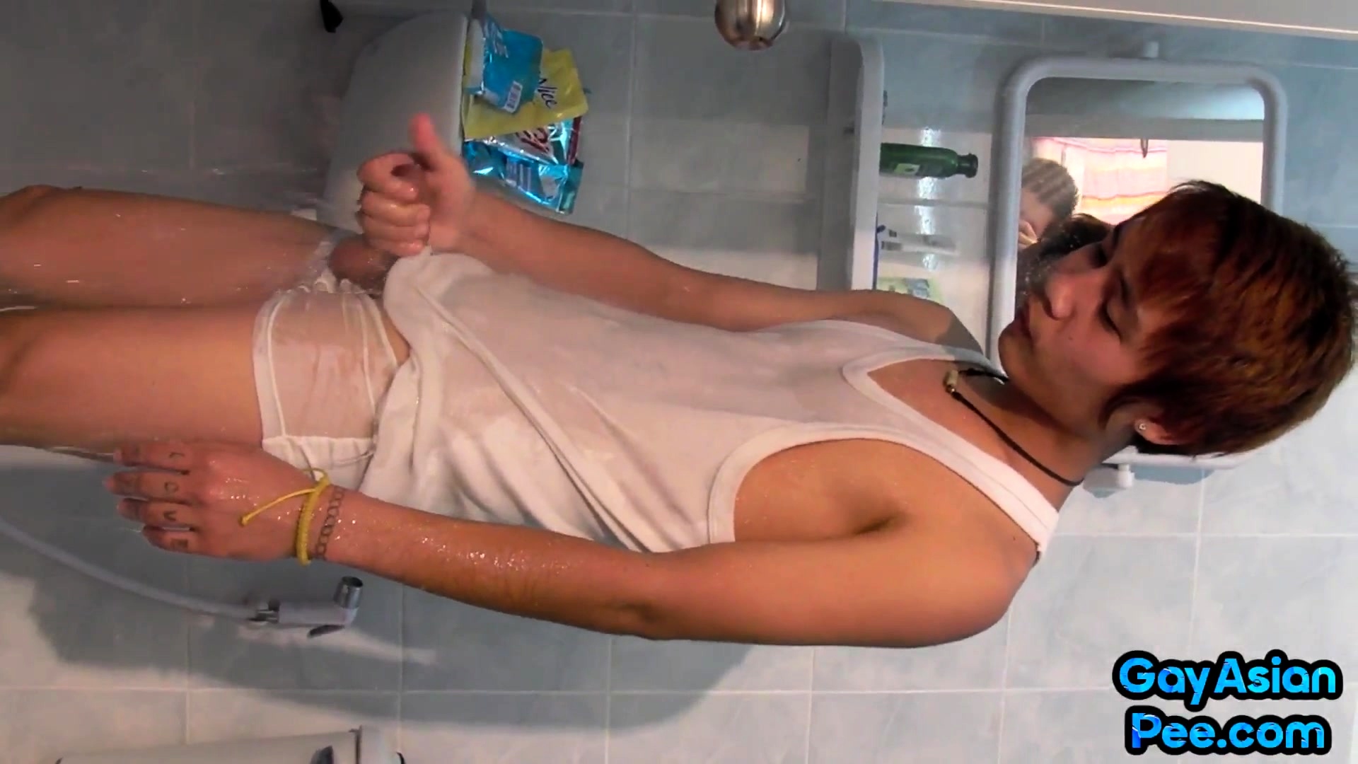 Golden piss Asian twink masturbates cock