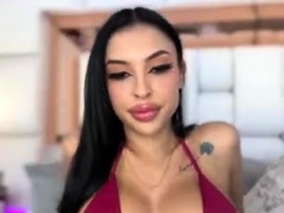 Busty babe playing with her big boobs