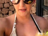 Blonde is flashing her big boobs in the outdoors