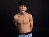 Curly twink boy shows off his slim body on webcam