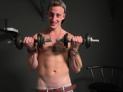 Handsome boy showing off his muscle body